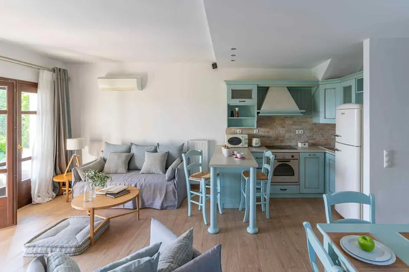 Classic Style Villa: the living room and pastel-blue kitchen