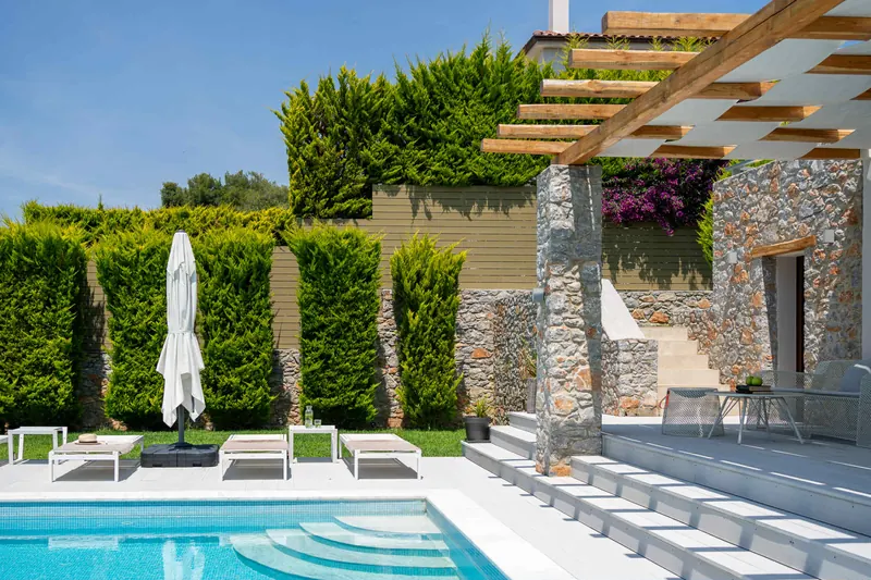 Modern Style Villa: the pool, sun loungers and stone steps