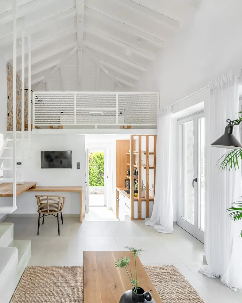 Stone Loft Suite: the white interior and the loft above